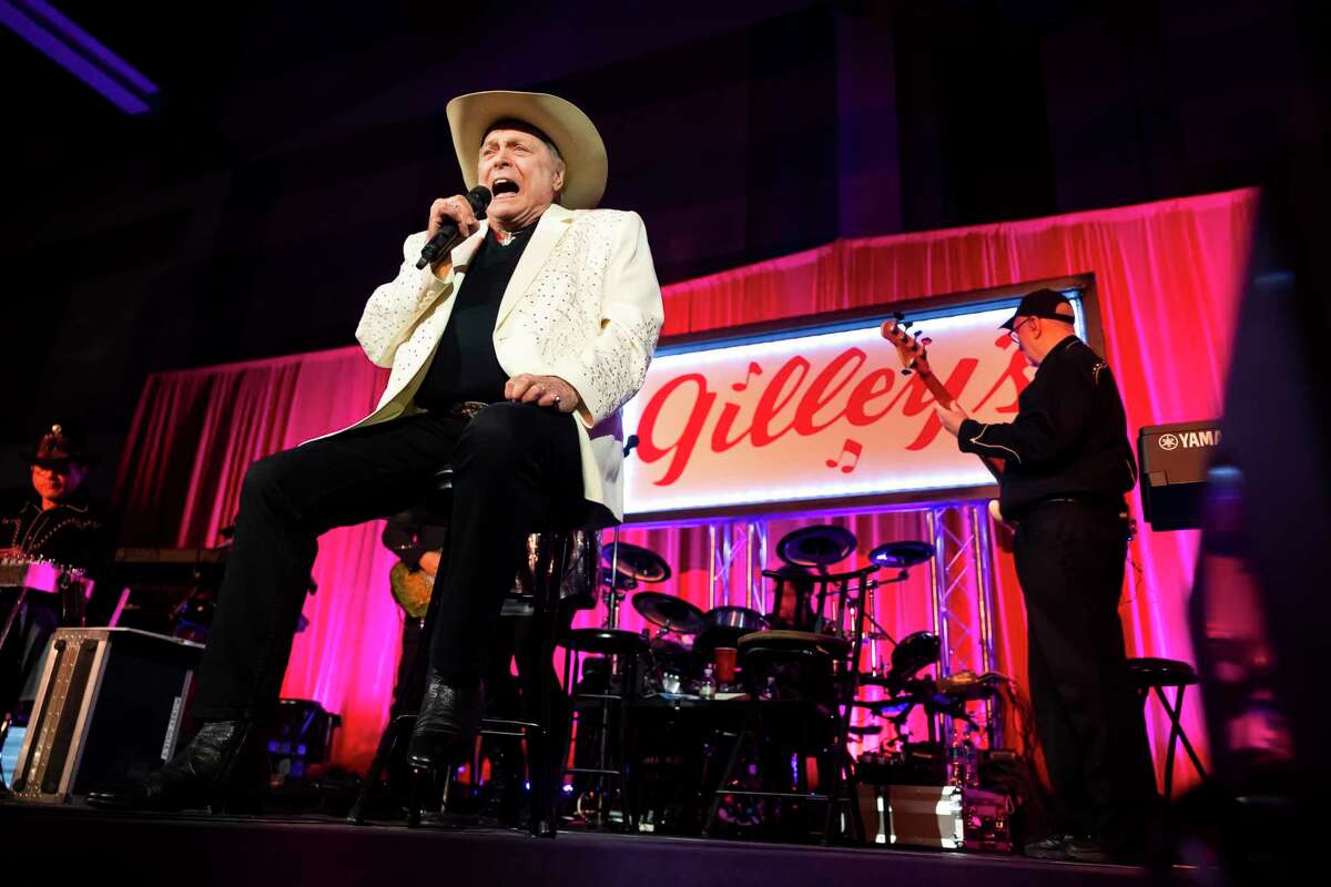 Mickey Gilley singing during Gilley’s 50th Anniversary Celebration at the Galveston Island Convention Center in February 2022. The country music icon who helped make Pasadena famous has died. 