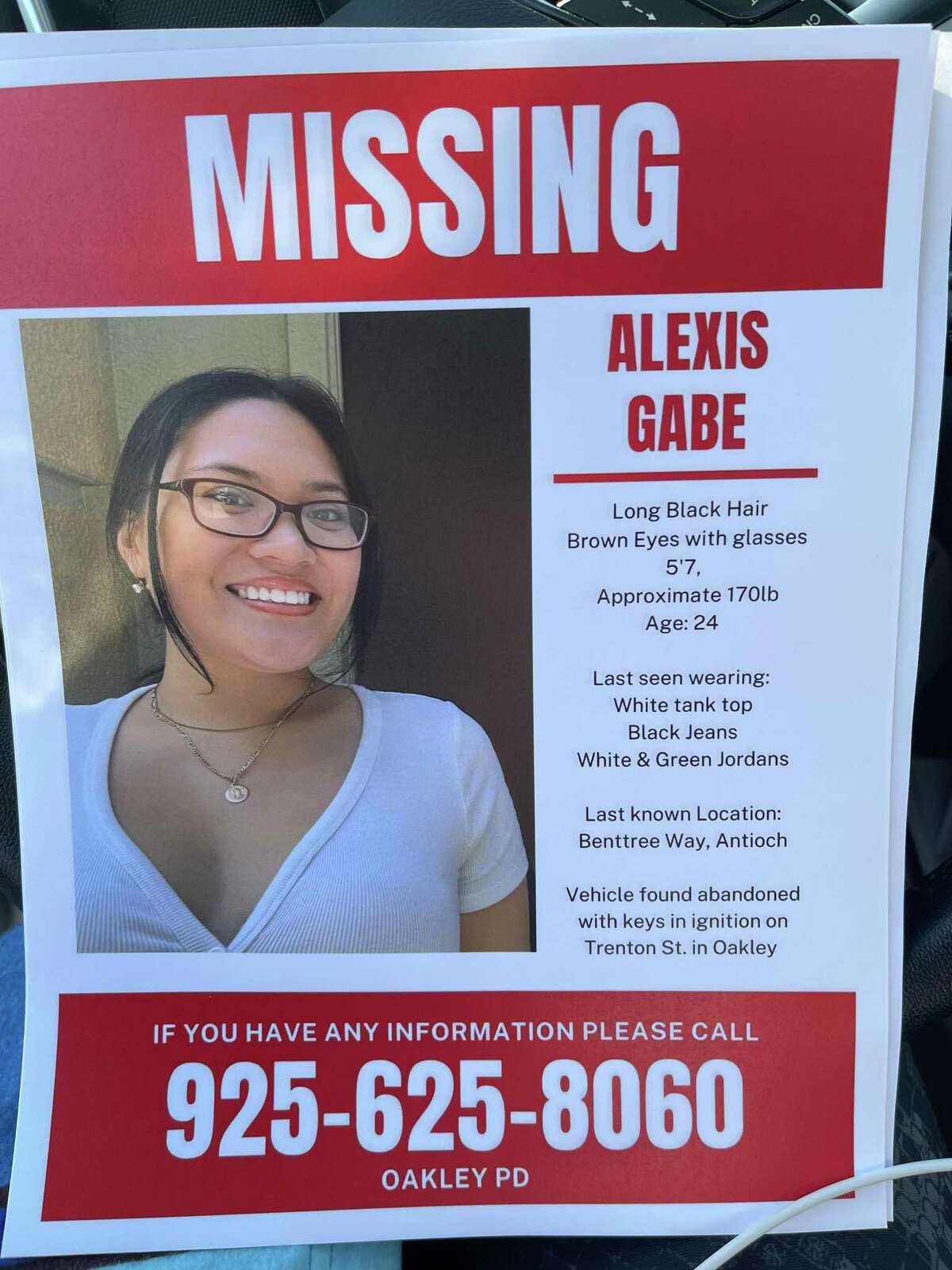 This file photograph shows a missing poster for Alexis Gabe, a 24-year-old woman from Oakley who was last seen in January 2022.