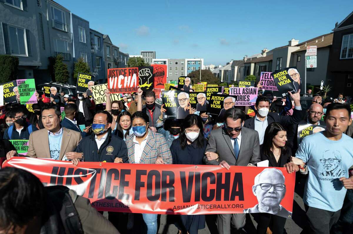 Charles Jung (front left), executive director of the California Asian Pacific Bar Association, City Attorney David Chiu, Mayor London Breed, Monthanus Ratanapakdee and community members rally against anti-Asian violence.
