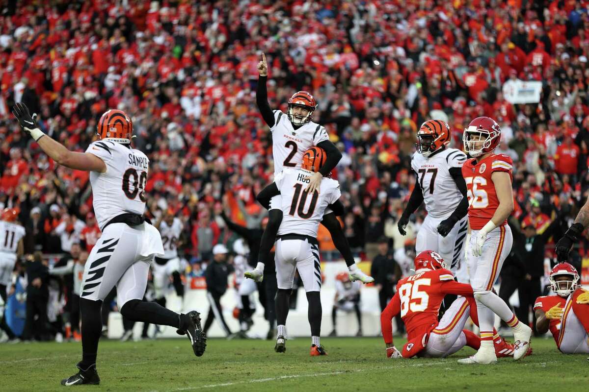 KANSAS CITY, MISSOURI - JANUARY 30: Kicker Evan McPherson #2 of the Cincinnati Bengals celebrates after kicking the game winning field goal in overtime against the Kansas City Chiefs in the AFC Championship Game at Arrowhead Stadium on January 30, 2022 in Kansas City, Missouri. (Photo by Jamie Squire/Getty Images)