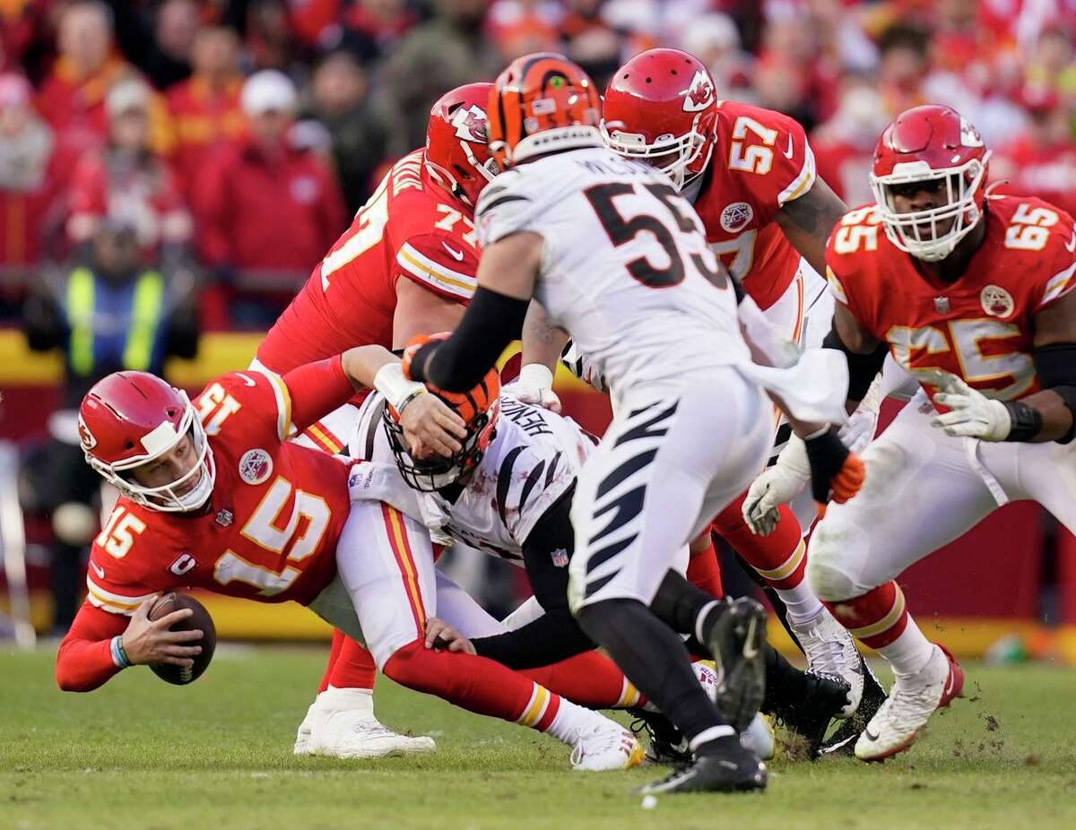 Chiefs quarterback Patrick Mahomes is sacked by Bengals defensive end Trey Hendrickson.
