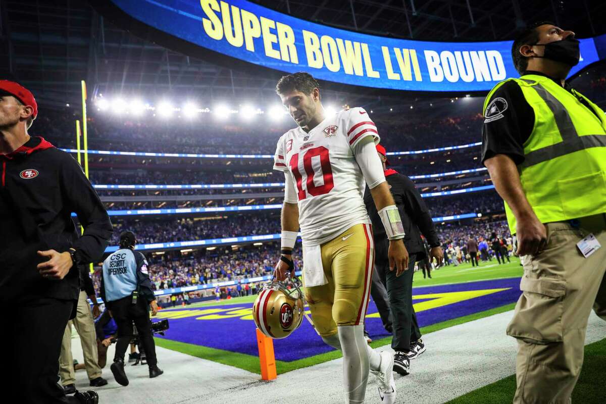 San Francisco 49ers quarterback Jimmy Garoppolo (10) walks off the field after the Los Angeles Rams defeat the San Francisco 49ers in the NFL NFC Championship game at SoFi Stadium in Inglewood, Calif., on Sunday, January 30, 2022.