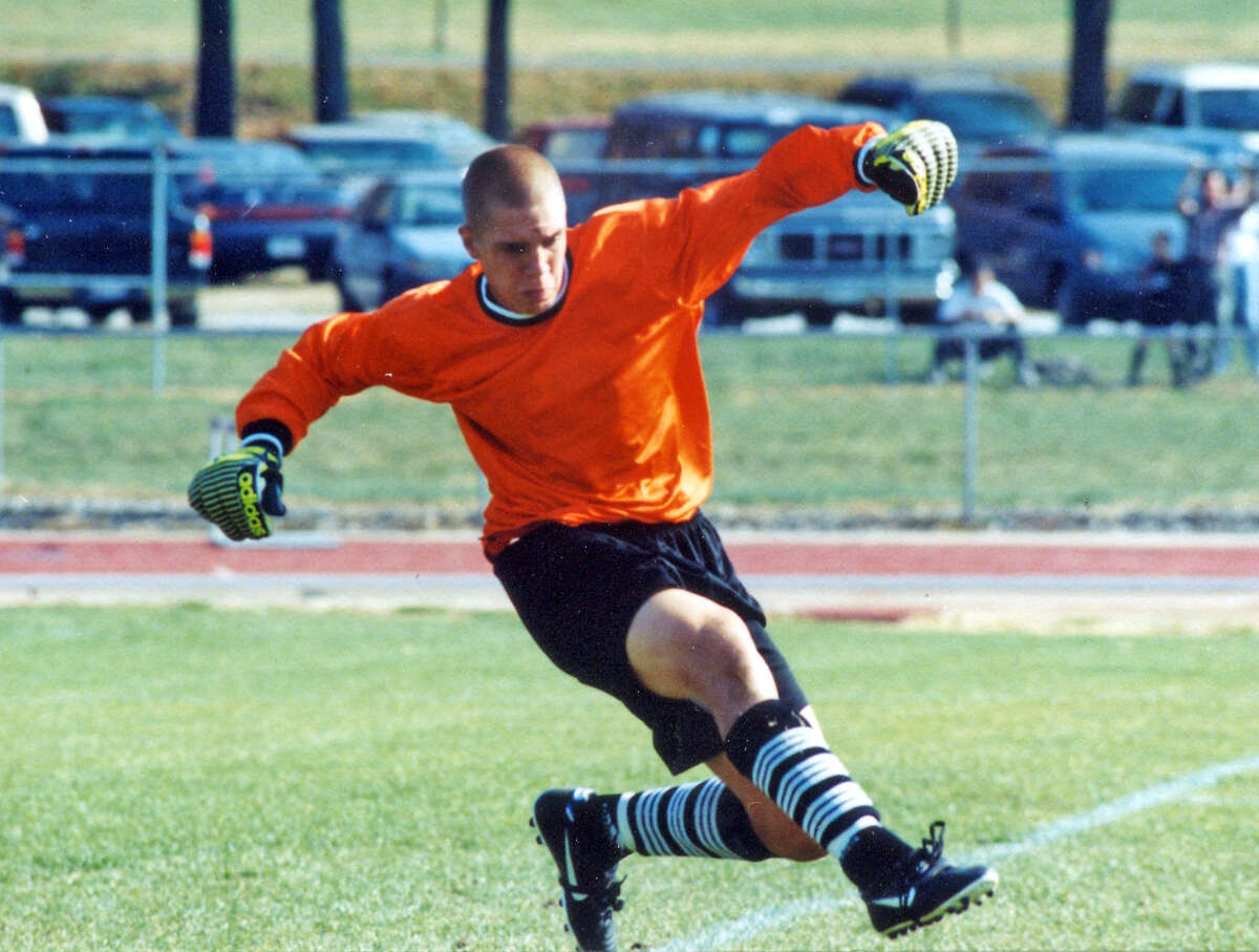 Goalkeeper Nathan Gibson makes a save during his soccer playing days at Edwardsville High School.