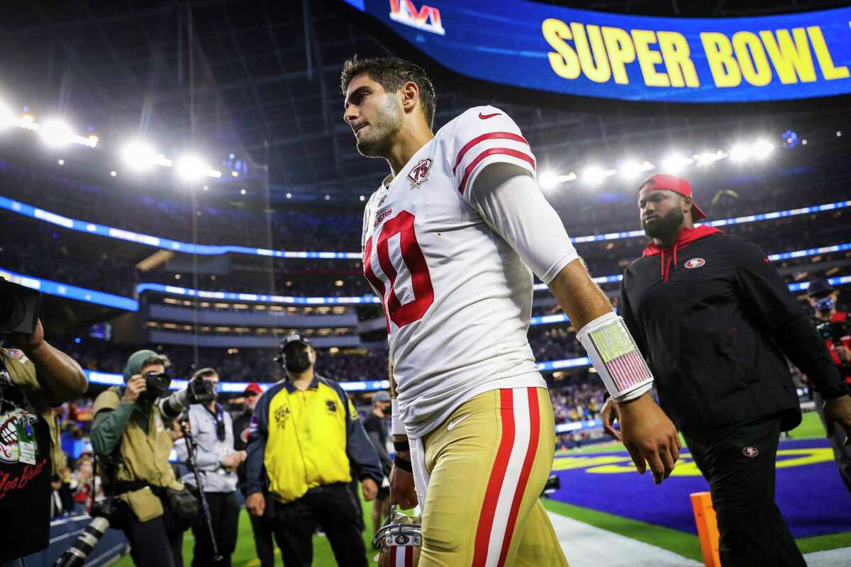 San Francisco 49ers quarterback Jimmy Garoppolo (10) walks off the field after the Los Angeles Rams defeat the San Francisco 49ers in the NFL NFC Championship game at SoFi Stadium in Inglewood, Calif., on Sunday, January 30, 2022.