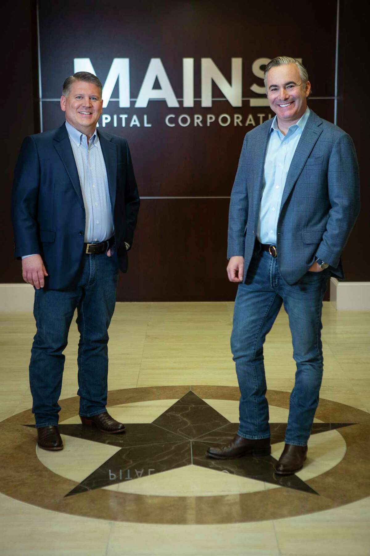 Main Street Capital Corporation’s Dwayne Hyzak, CEO, and David Magdol, president and chief investment officer, pose for a portrait in the company’s offices Thursday, Jan. 20, 2022 in Houston.