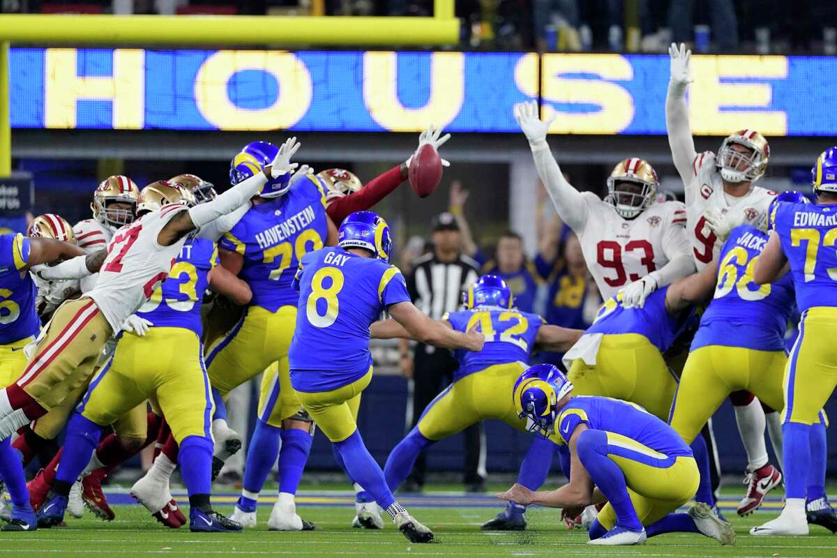 Los Angeles Rams' Matt Gay (8) kicks a field goal with the "Rams House" signage in the background during the second half of the NFC Championship game against the San Francisco 49ers Sunday, Jan. 30, 2022, in Inglewood, Calif.