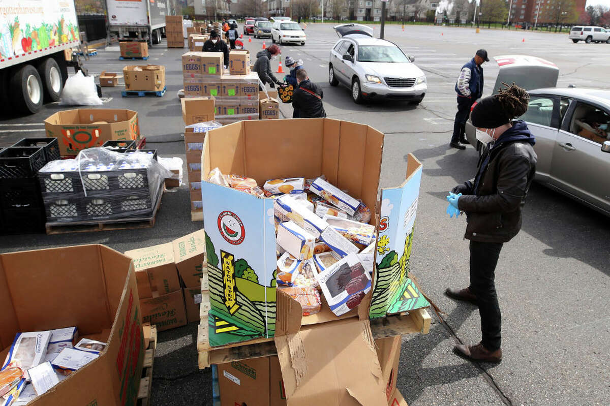 February’s mobile food pantry distribution is set to include vitamin-rich produce and proteins, including grapefruit, potatoes, apples, ground turkey and cheese. (Pictured: April 14, 2020.)