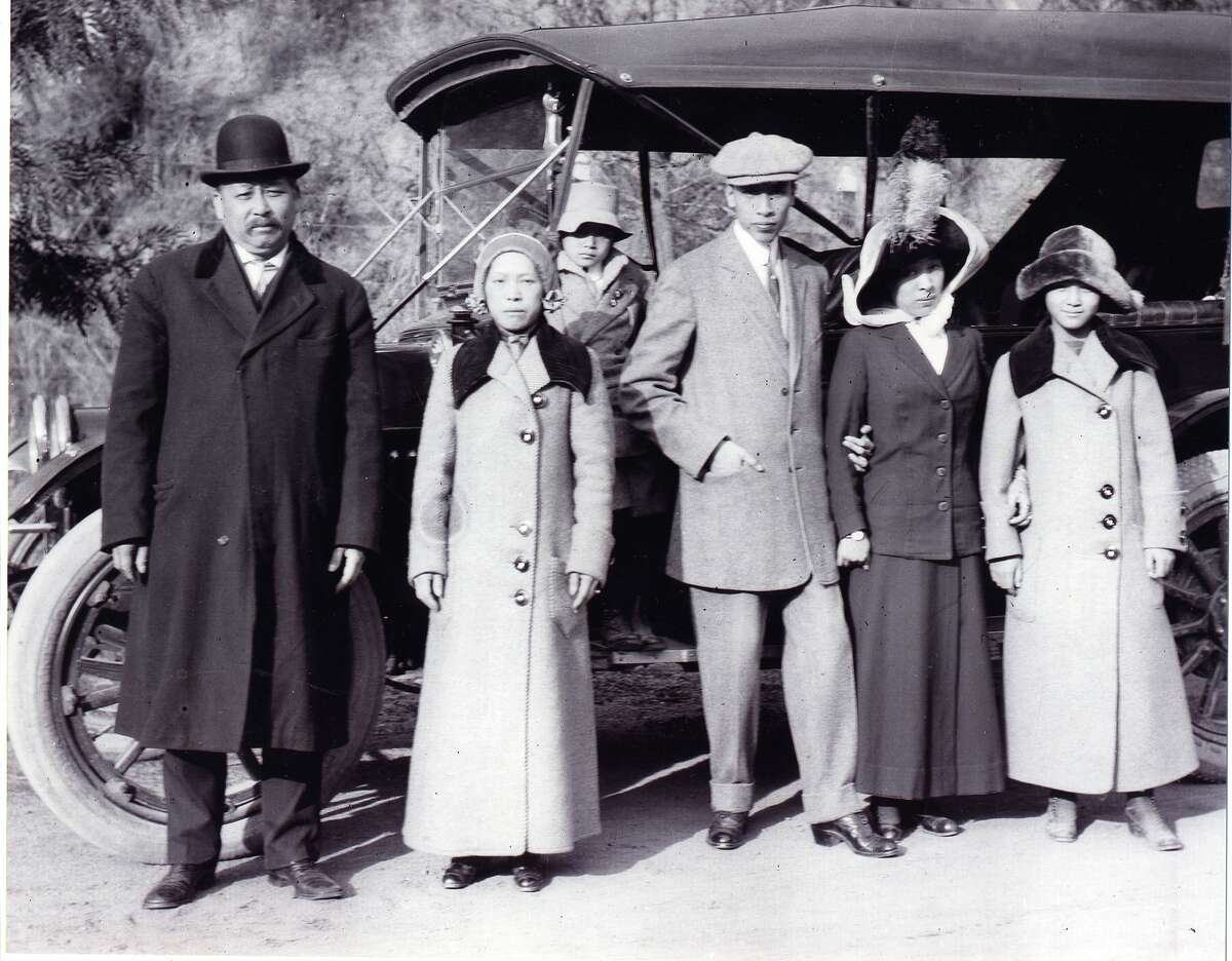 Lew Hing (left) with his family.
