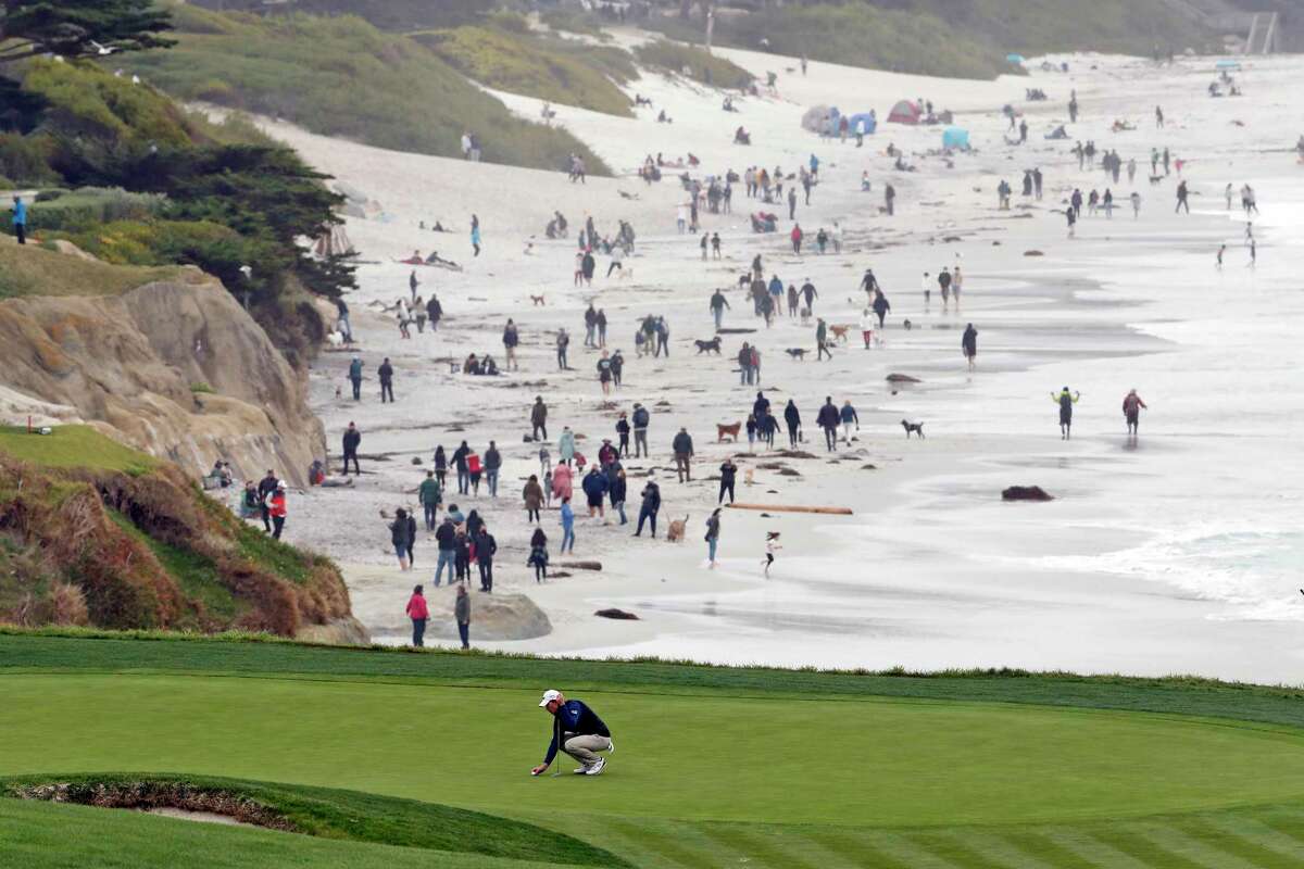 Maverick McNealy lines up his putt on 8th hole during final round of 2021 AT&T Pebble Beach Pro-Am in Pebble Beach, Calif., on Sunday, February 14, 2021.