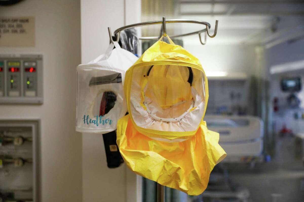 A face covering hangs on a hook in the COVID ward at Salinas Valley Memorial Hospital in Salinas, Calif.