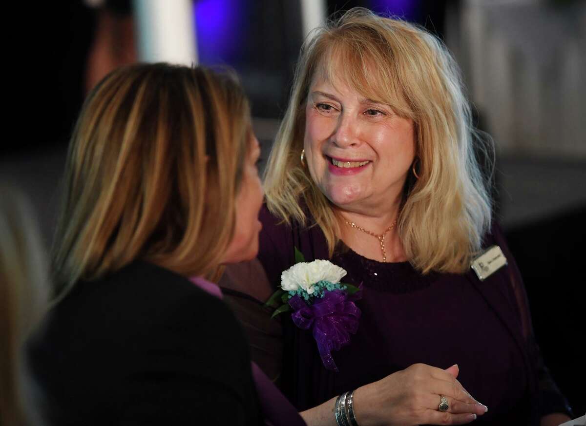 Center for Family Justice President and CEO Debra Greenwood, right, at the annual Speaking of Women fund raising luncheon at The Waterview in Monroe, Conn. on Tuesday, September 20, 2021.