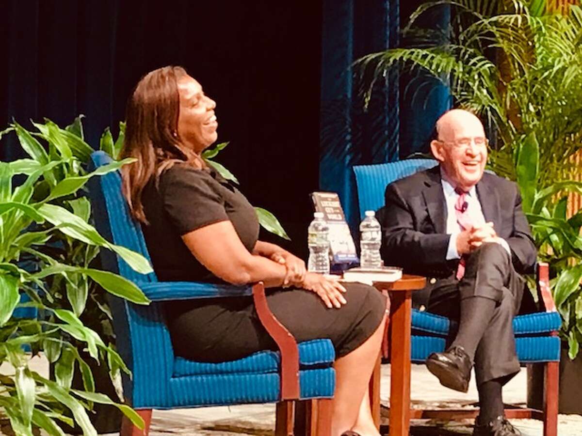 New York Attorney General Letita James with former state A.G. Bob Abrams share a laugh during a discussion of Abrams’ memoir in September in Albany.