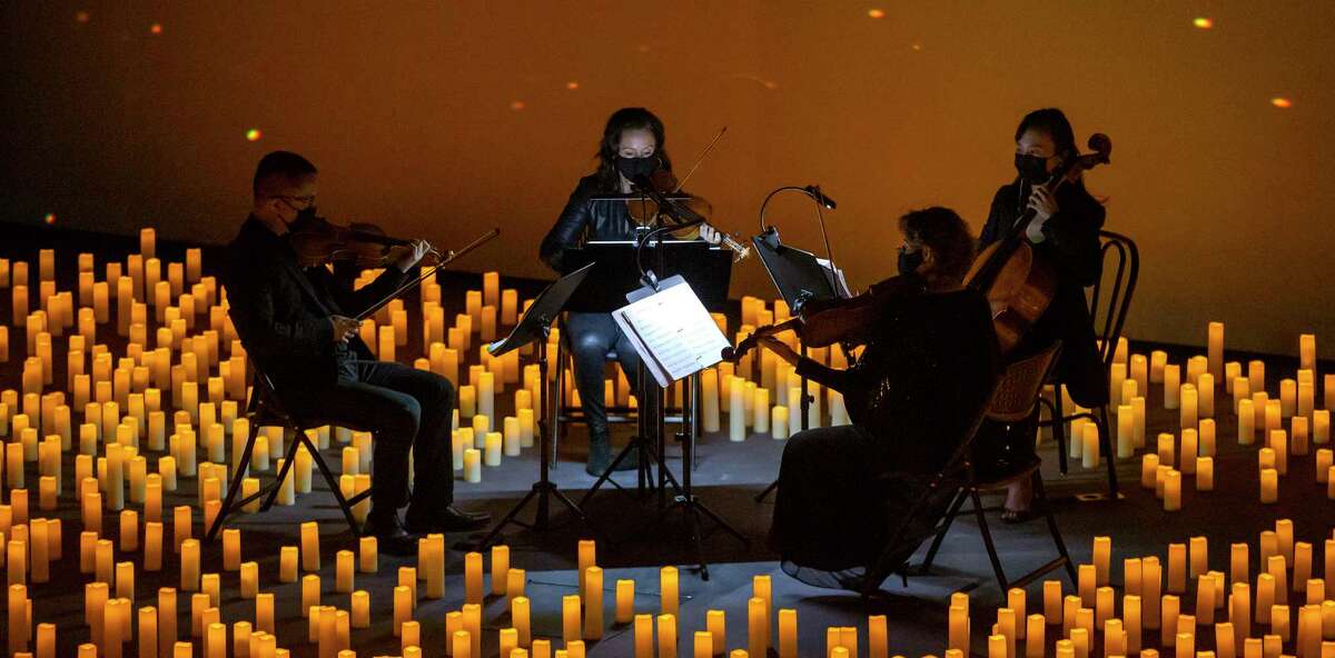 The Listeso String Quartet plays a concert at the Magik Theatre lit by candlelight. The performance was part of the Candlelight Concert series, which is being staged in San Antonio at Magik and at the Josephine Theatre.