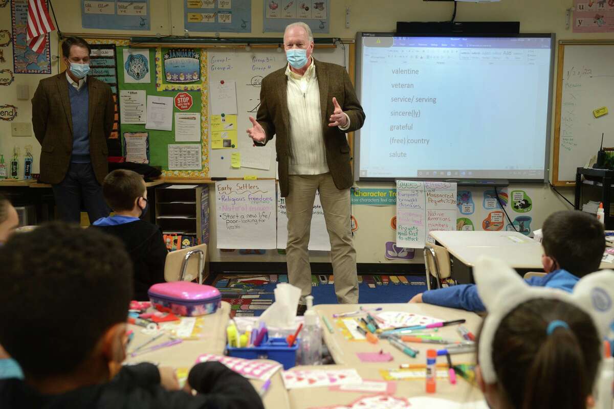 Former First Selectman Ray Baldwin speaks to a classroom of fourth graders at Frenchtown Elementary School, in Trumbull, Conn. Jan. 28, 2022. Baldwin joined U.S. Rep. Jim Himes during the visit to speak to students as they worked on their Valentines for Vets project, which will deliver handmade cards to local veterans for Valentine’s Day. Baldwin, a life-long Trumbull resident, served as a U.S. Marine Corps in Viet Nam.