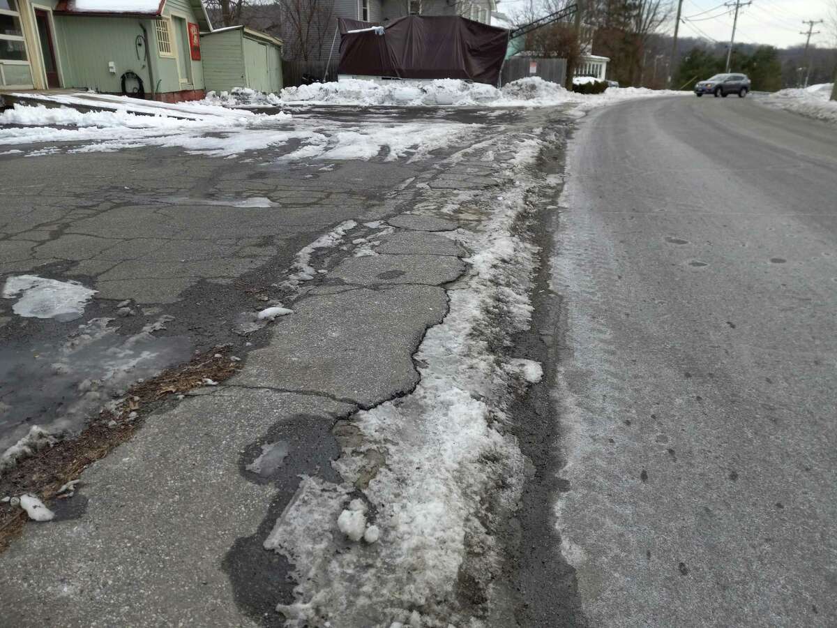 Winsted Town Manager Josh Kelly and Public Works Director Jim Rollins detailed a plan to repair some of the town’s worst roads. During a special meeting on Jan. 31, residents also asked whether sidewalks would be included in the plan.