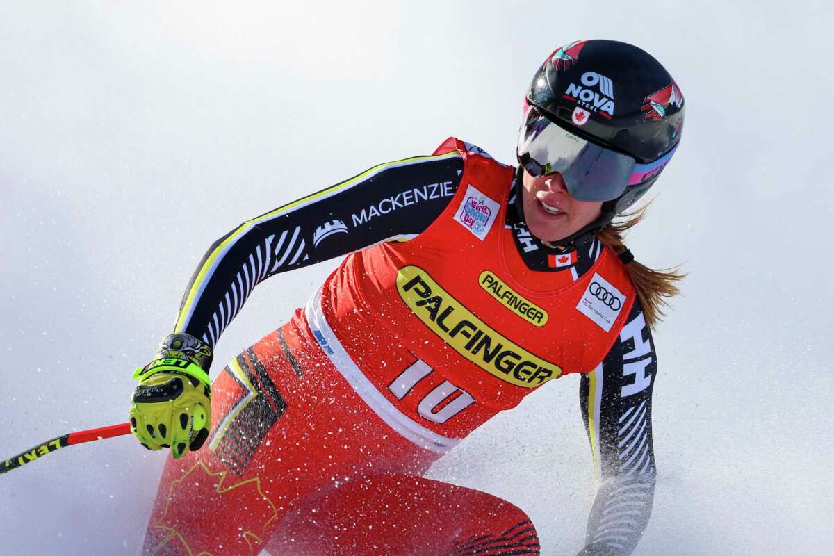 Canada's Marie Michele Gagnon crosses the finish line during a Women's World Cup downhill alpine ski race in Zauchensee, Austria, Saturday, Jan. 15, 2022. (AP Photo/Marco Trovati)