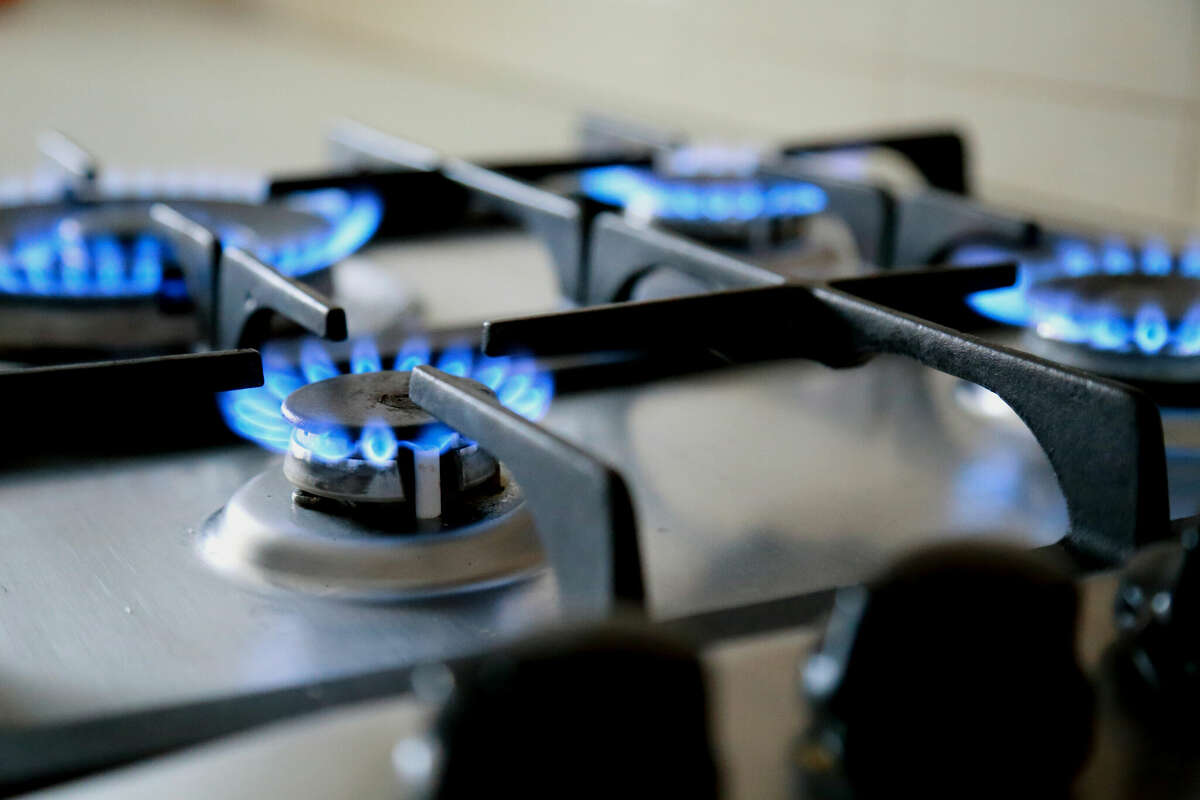 Representatives of about three dozen groups are advocating for the removal of a natural gas surcharge they say is unnecessary, and costly for customers.