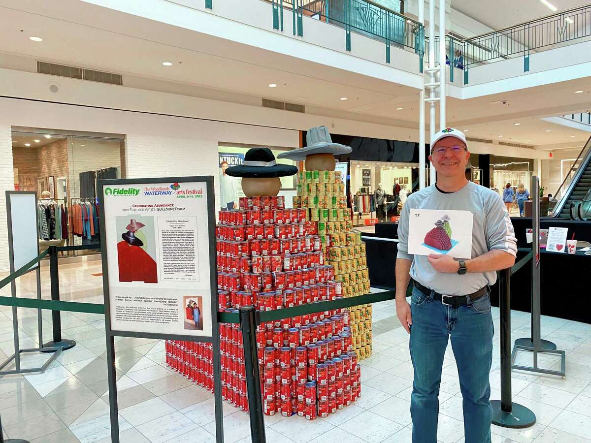 On Saturday at The Woodlands Mall, The Woodlands Arts Council members worked in conjunction with National Charities League - The Magnolias Chapter to assemble a 3-D replica of the featured art for the 2022 festival, titled “Celebrating Abundance,” an oil on metal by featured artist Guilloume.