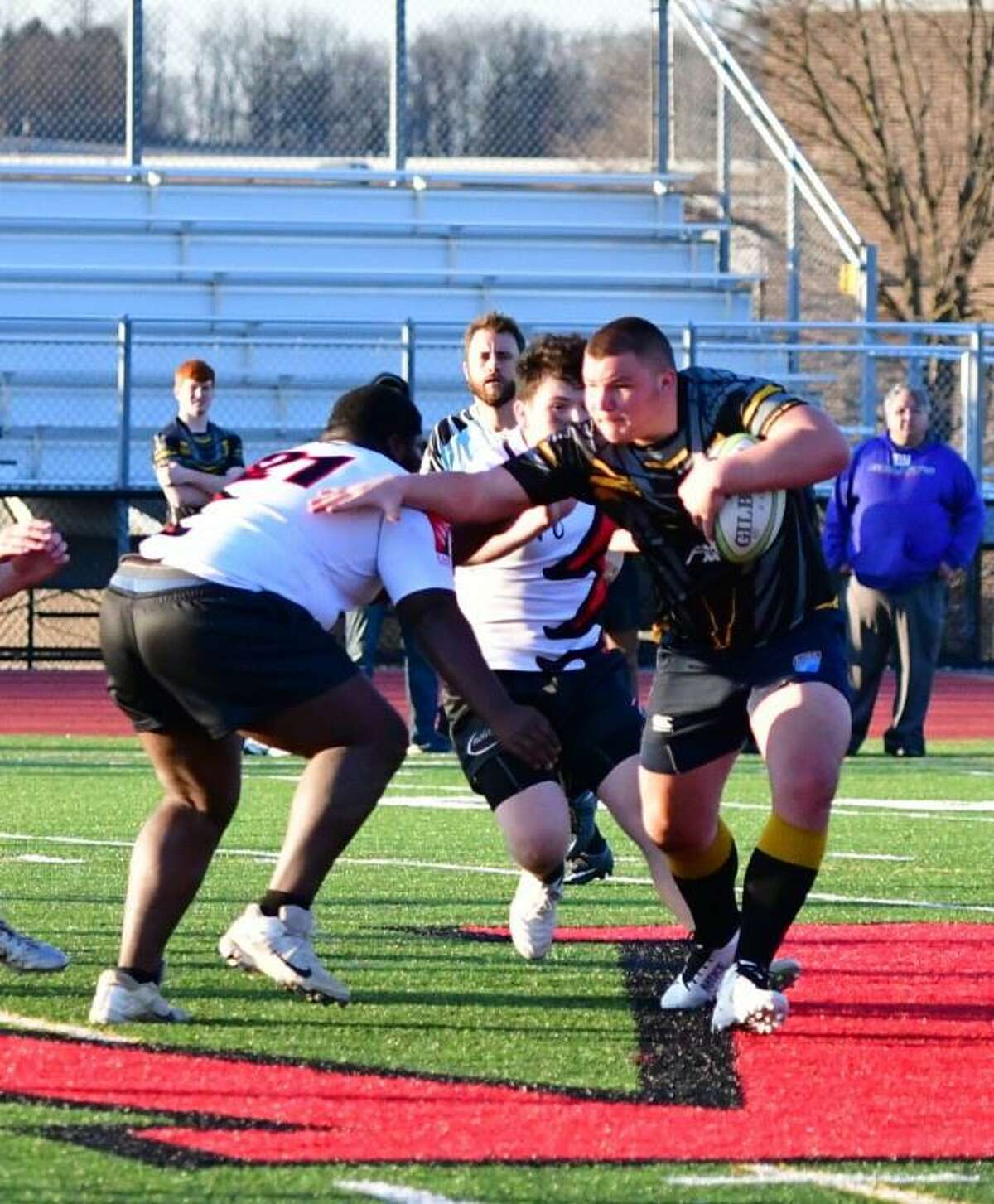 Matt Weiner makes a run towards a try.