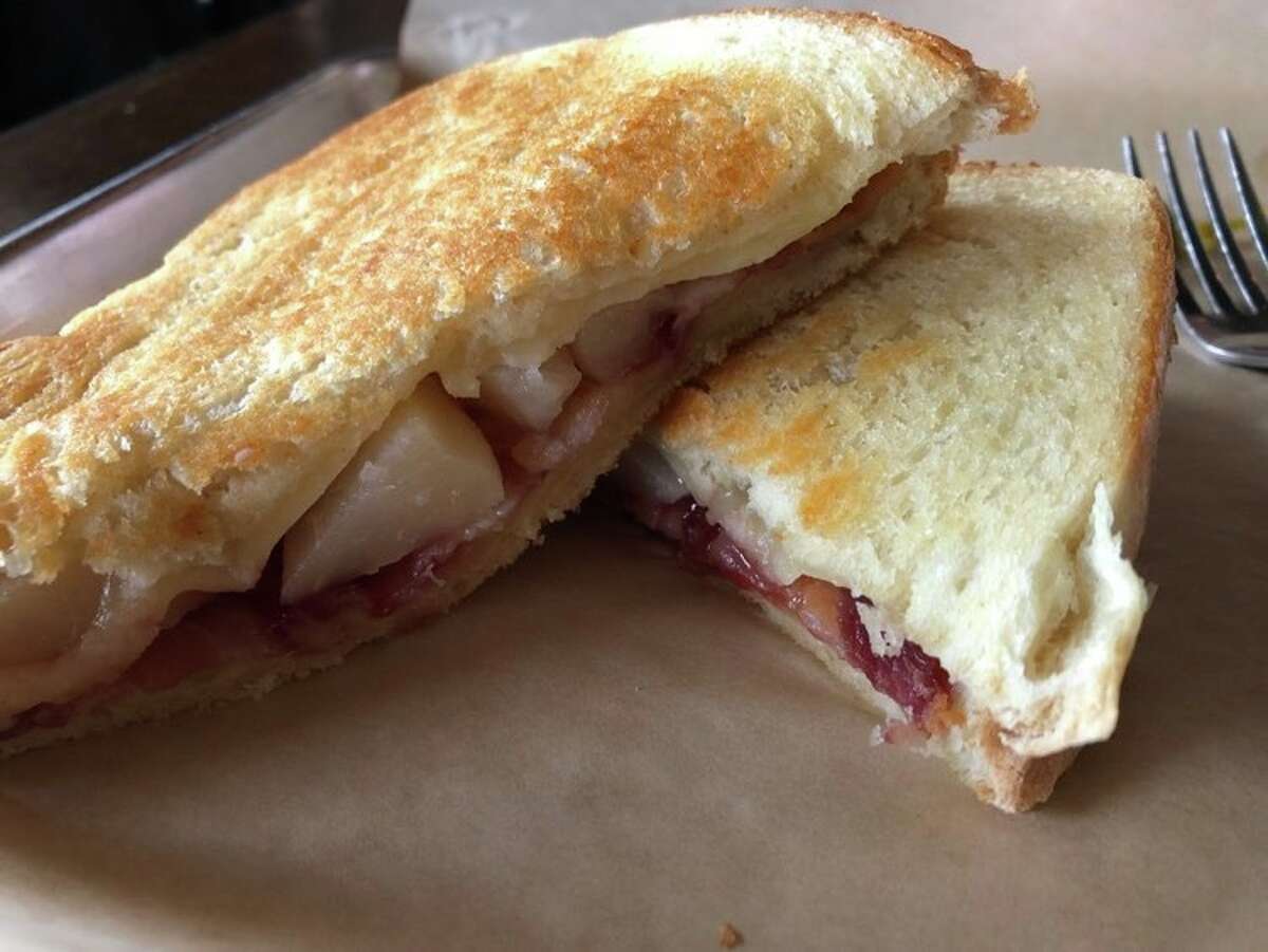 The Pomona sandwich at Live Oak Coffeehouse incorporates sourdough bread, raspberry jam, pear slices, white cheddar and bacon.