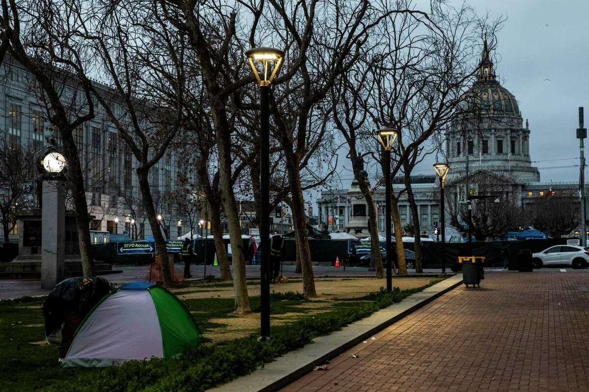 A tent is seen in the United Nations Plaza near the new Tenderloin Linkage Center in San Francisco.
