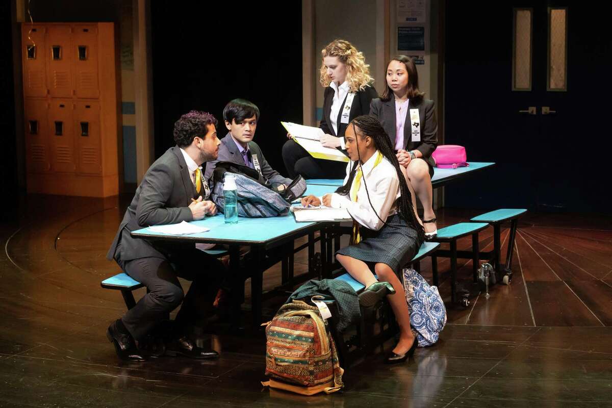 Pictured clockwise are Ricardo Dávila as Rich, Daniel Velasco as Dara, Sabrina Koss as Kailee, Mai Le as Allison, and Kiaya Scott as Sophie in Alley Theatre’s production of “High School Play: A Nostalgia Fest.”
