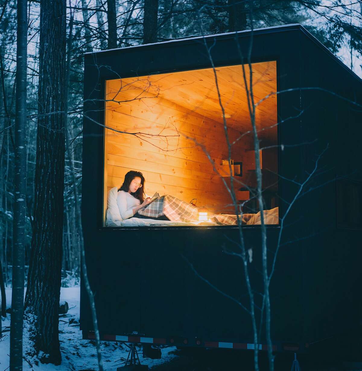 Getaway cabins come with a small libary to encourage snuggling up with a book.