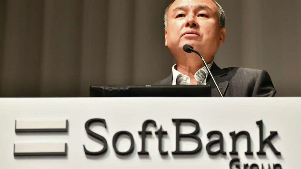 Softbank group CEO Masayoshi Son answers a question during a press conference announcing the company's financial results in Tokyo. SoftBank, which is controled by billionaire Masayoshi Son, limited the influence of former chief executive and co-founder Adam Neumann.