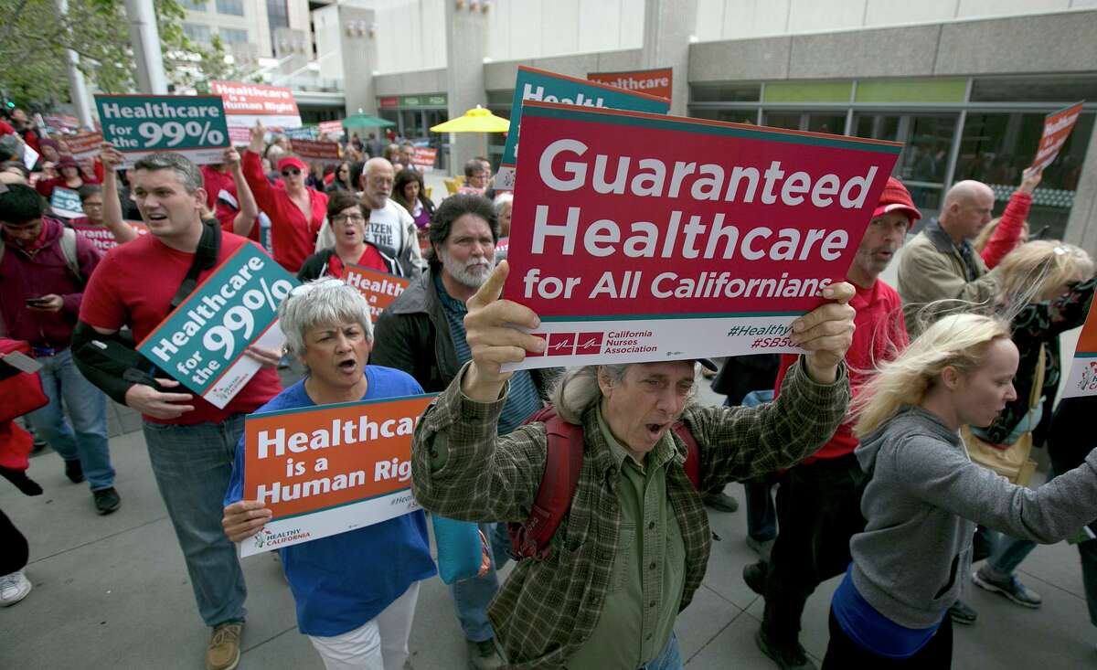 Supporters of single-payer health care march to the Capitol on April 26, 2017, in Sacramento.