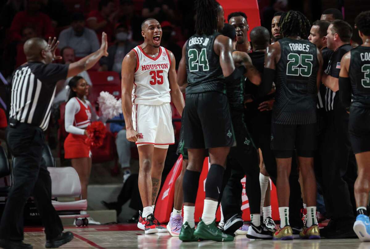 Houston Cougars forward Fabian White Jr. (35) celebrates at the end of the first half of a NCAA men’s basketball game Wednesday, Feb. 2, 2022, at the Fertitta Center in Houston.