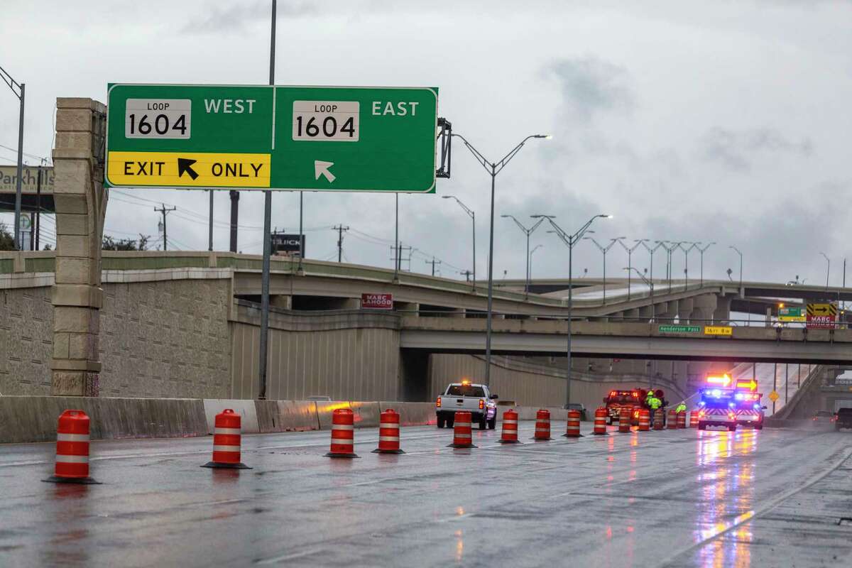 Crews close the ramps Thursday, Feb. 3, 2022 from US 281 northbound to Loop 1604 due to freezing rain falling on San Antonio?•s north side.