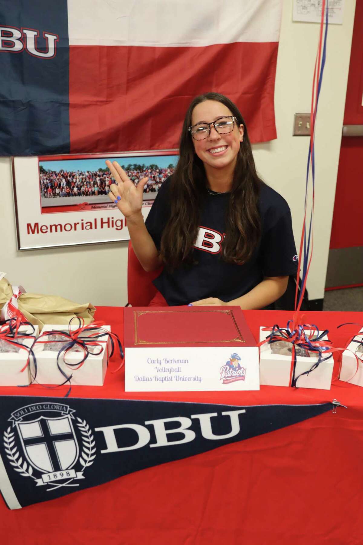 Memorial's Carly Berkman signed her National Letter of Intent to play volleyball at Dallas Baptist University during a signing ceremony at the school on Feb. 2 for National Signing Day