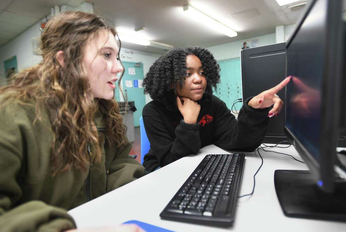 Information Technology students Bridgette Nealy, 17, and Aurelie Elias, 16, both of West Haven, helped Platt Tech to the College Board Computer Science Female Diversity Award at the technical high school in Milford, Conn. on Thursday, January 27, 2021.