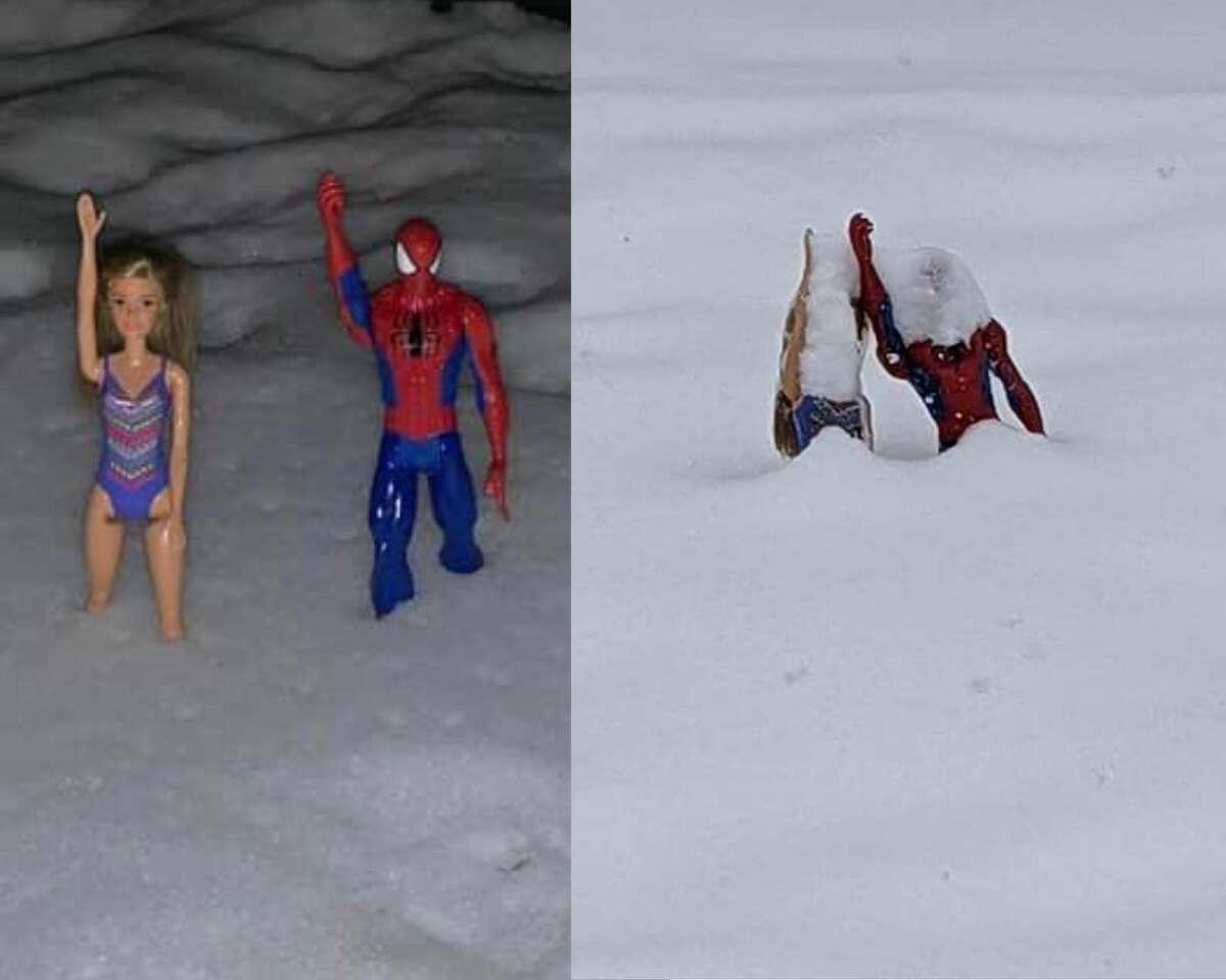 Local resident Amanda Cooper shared two images of children's toys, Spider-Man and Barbie, keeping track of snow totals on Wednesday, Feb. 2, 2022 near Midland. 