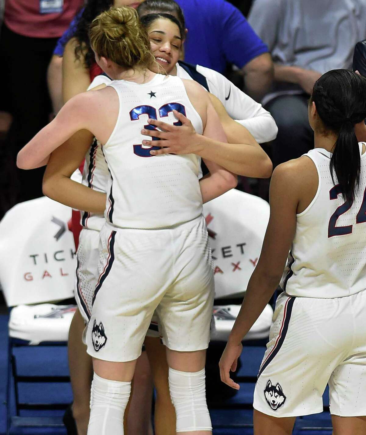 UConn’s Katie Lou Samuelson (33) embraces teammate Gabby Williams at the end an NCAA college basketball game in the American Athletic Conference women's tournament final at Mohegan Sun Arena, Tuesday, March 6, 2018, in Uncasville, Conn.