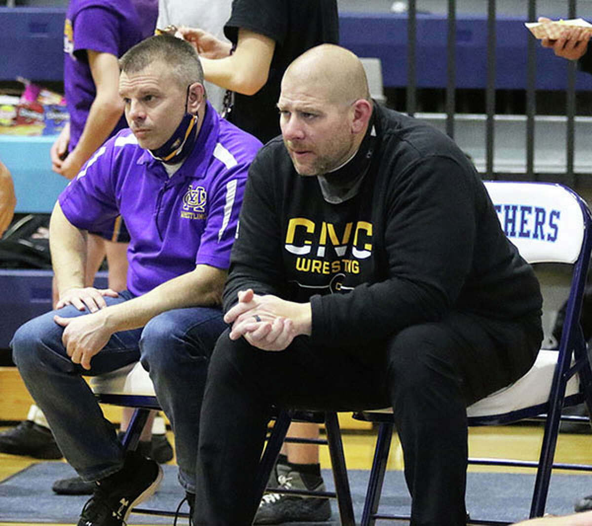 CM coach Jeremy Christeson (right) and assistant coach Chad Young will lead the Eagles into their own IHSA Class 2A individual regional tourney Saturday in Bethalto.