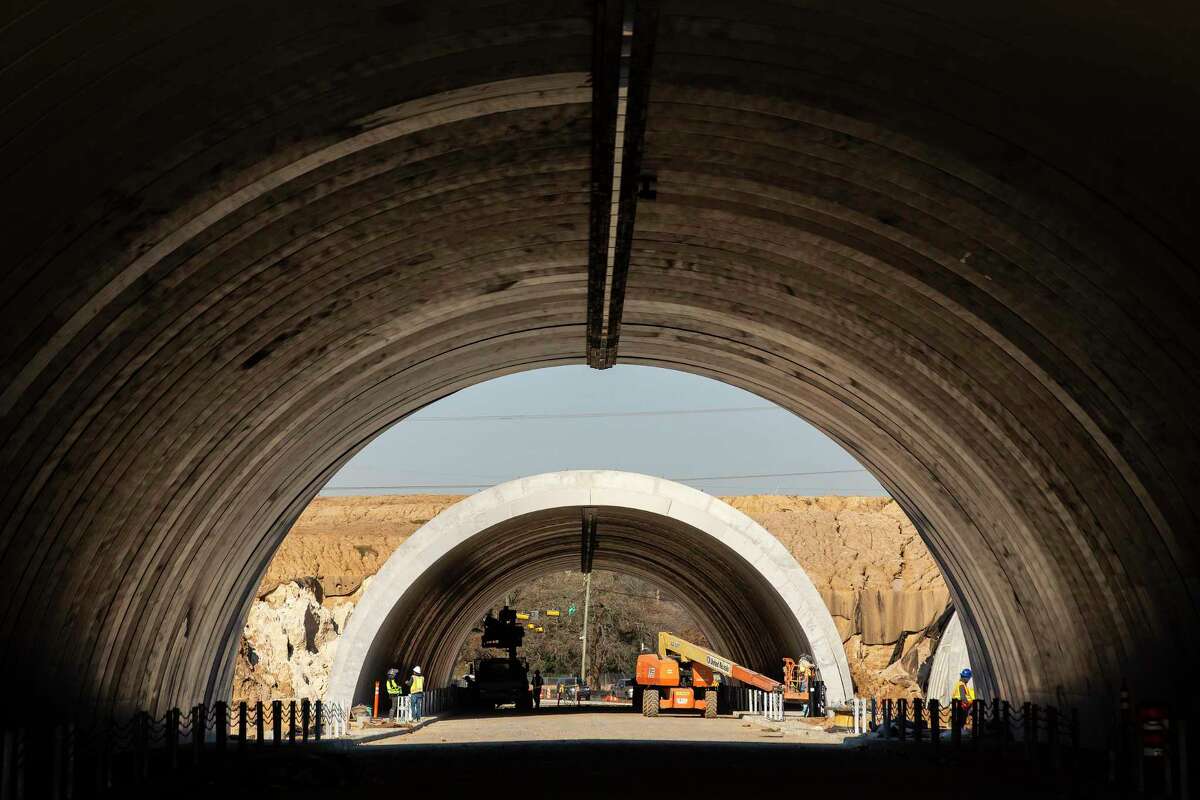 Work continues on the Memorial Park land bridge and tunnels, whichwill be open to the public Feb. 5 for a preview party.