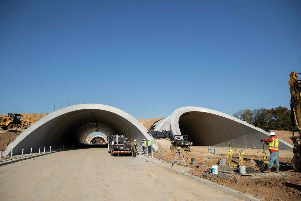 Work continues on the Memorial Park land bridge and tunnels, whichwill be open to the public Feb. 5 for a preview party.