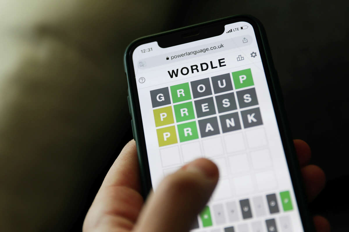 Wordle game displayed on a phone screen. 