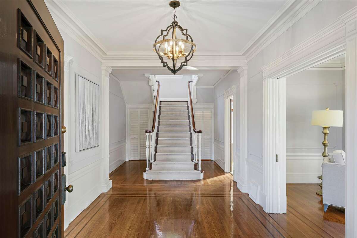 A grand entrance hall showcases the original 1916 bones.