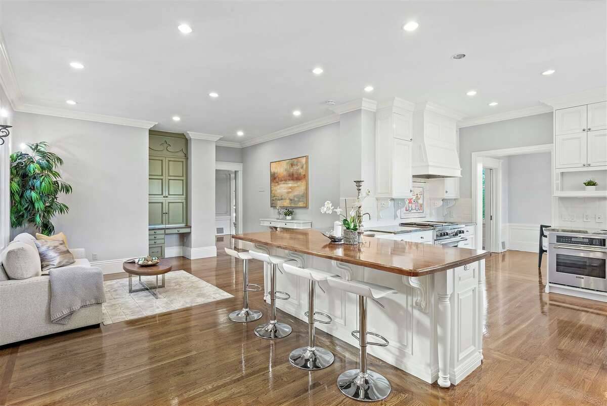 The kitchen is spacious and modern.