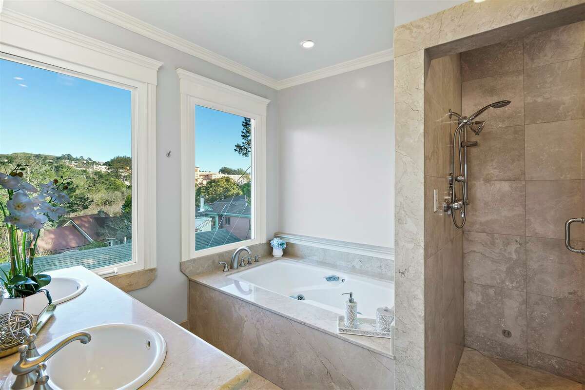 The primary bath is like a mini spa.