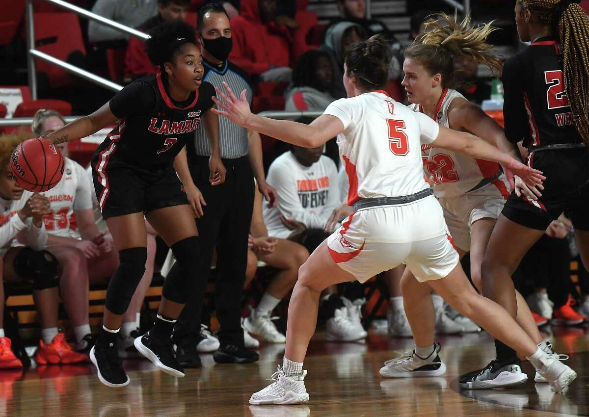 Lamar's Sabbria Dean is pressed by UT Rio Grande Valley's Taylor Muff during Thursday's match-up at the Montagne Center. Photo made Thursday, Feruary 3, 2022 Kim Brent/The Enterprise