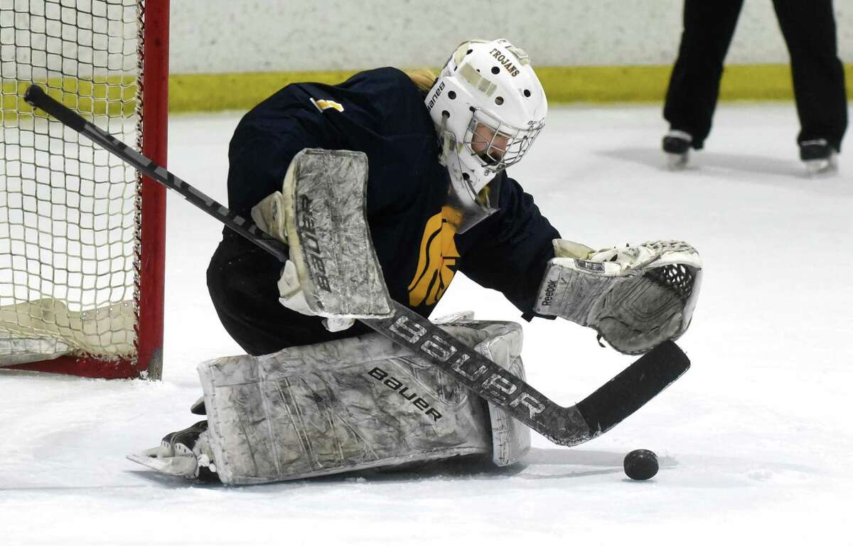 Simsbury goalie Kaitlyn O'Brien makes a save during a girls ice hockey game against Darien at the Darien Ice House on Jan. 26, 2022