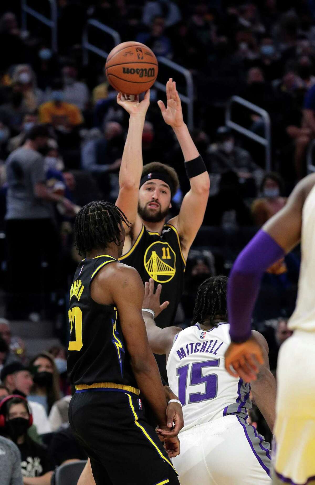 Klay Thompson (11) shoots a three pointer in the first half as the Golden State Warriors played the Sacramento Kings at Chase Center in San Francisco, Calif., on Thursday, February 3, 2022.