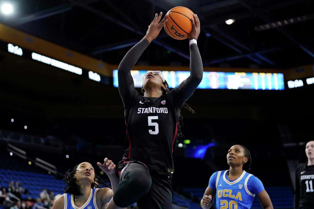 Stanford forward Francesca Belibi (5) drives to the basket against UCLA during the first half of an NCAA college basketball game Thursday, Feb. 3, 2022, in Los Angeles. (AP Photo/Marcio Jose Sanchez)