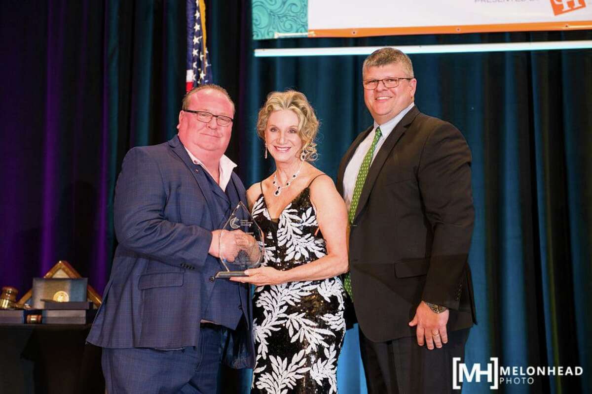 Pictured from left are Steve hall, Rebecca Riley and Scott Harper. Hall was presented the Horizon Award at the Chamber's Jan. 29 Chairman's Ball