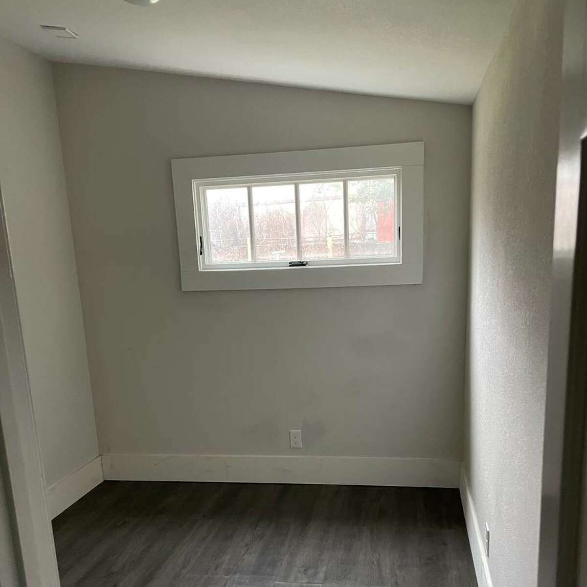 Here's the bedroom. It doesn't look like much, but the sloped ceiling is inviting. 