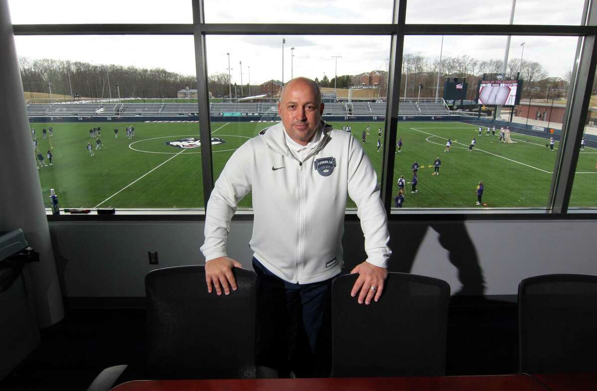 UConn Athletic Director David Benedict, poses at the Joseph J. Morrone Stadium at Rizza Performance Center on the campus in Storrs, Conn., on Thursday Mar. 4, 2021.