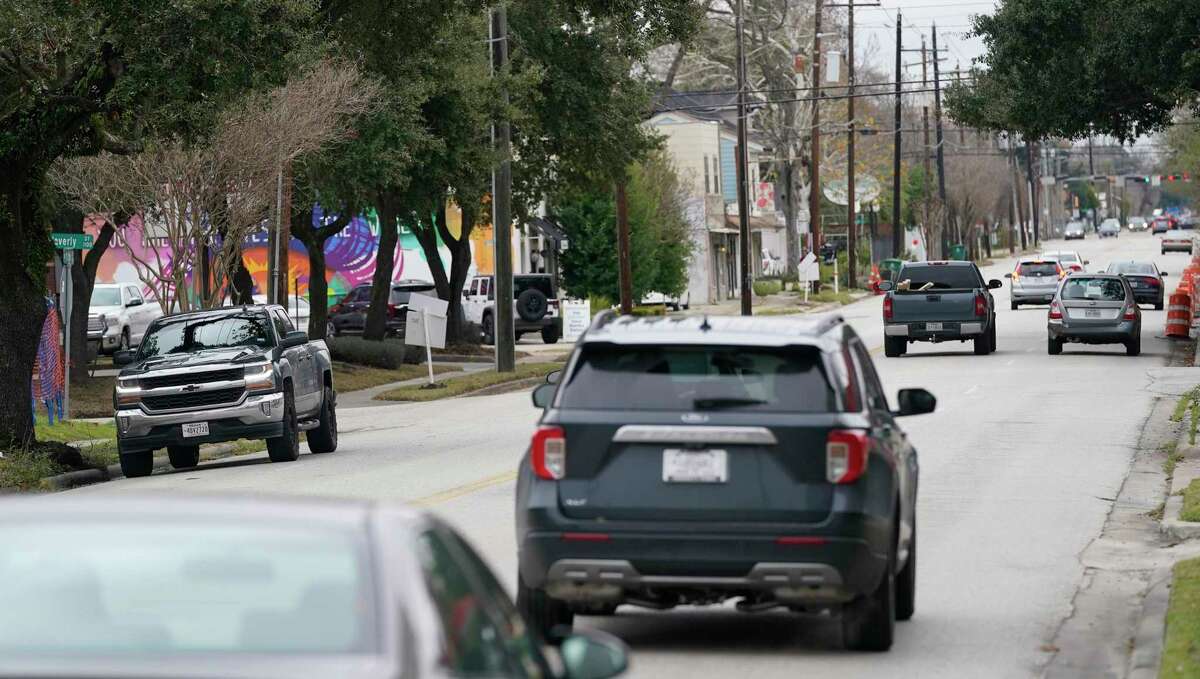 Traffic is shown along 11th Street near the Heights Hike and Bike Trail on Thursday, Feb. 3, 2022 in Houston.